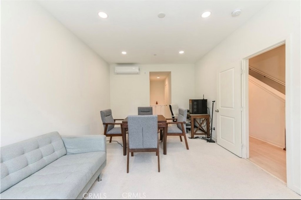 175 Frame Irvine, CA 92618 - Photo 12 of 22 a living room with furniture and a flat screen tv