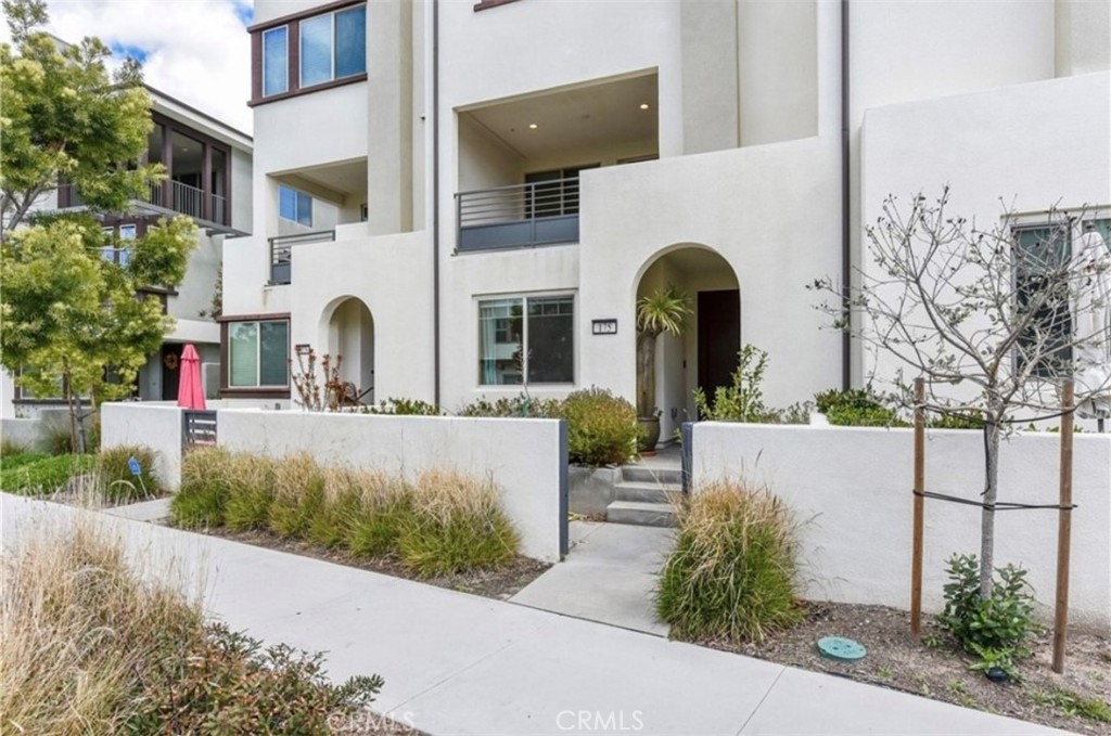 175 Frame Irvine, CA 92618 - Photo 20 of 22 a front view of a house with a garden