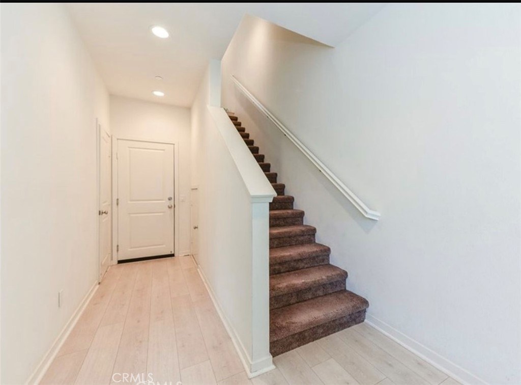 175 Frame Irvine, CA 92618 - Photo 4 of 22 a view of a hallway with staircase