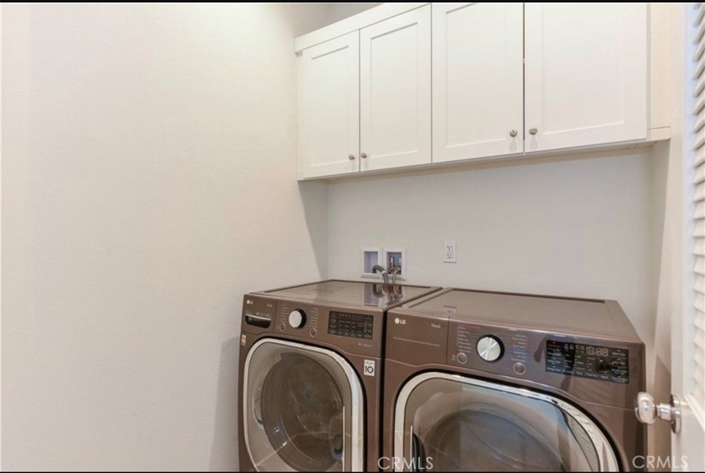 175 Frame Irvine, CA 92618 - Photo 6 of 22 a utility room with dryer and washer