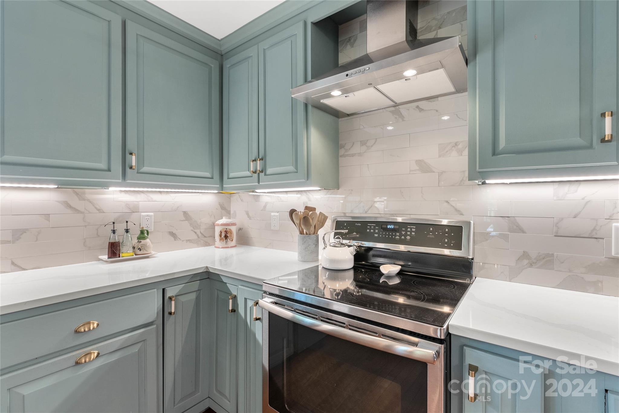 1154 Landrum Road Columbus, NC 28722 - Photo 14 of 36 a kitchen with a sink cabinets and appliances