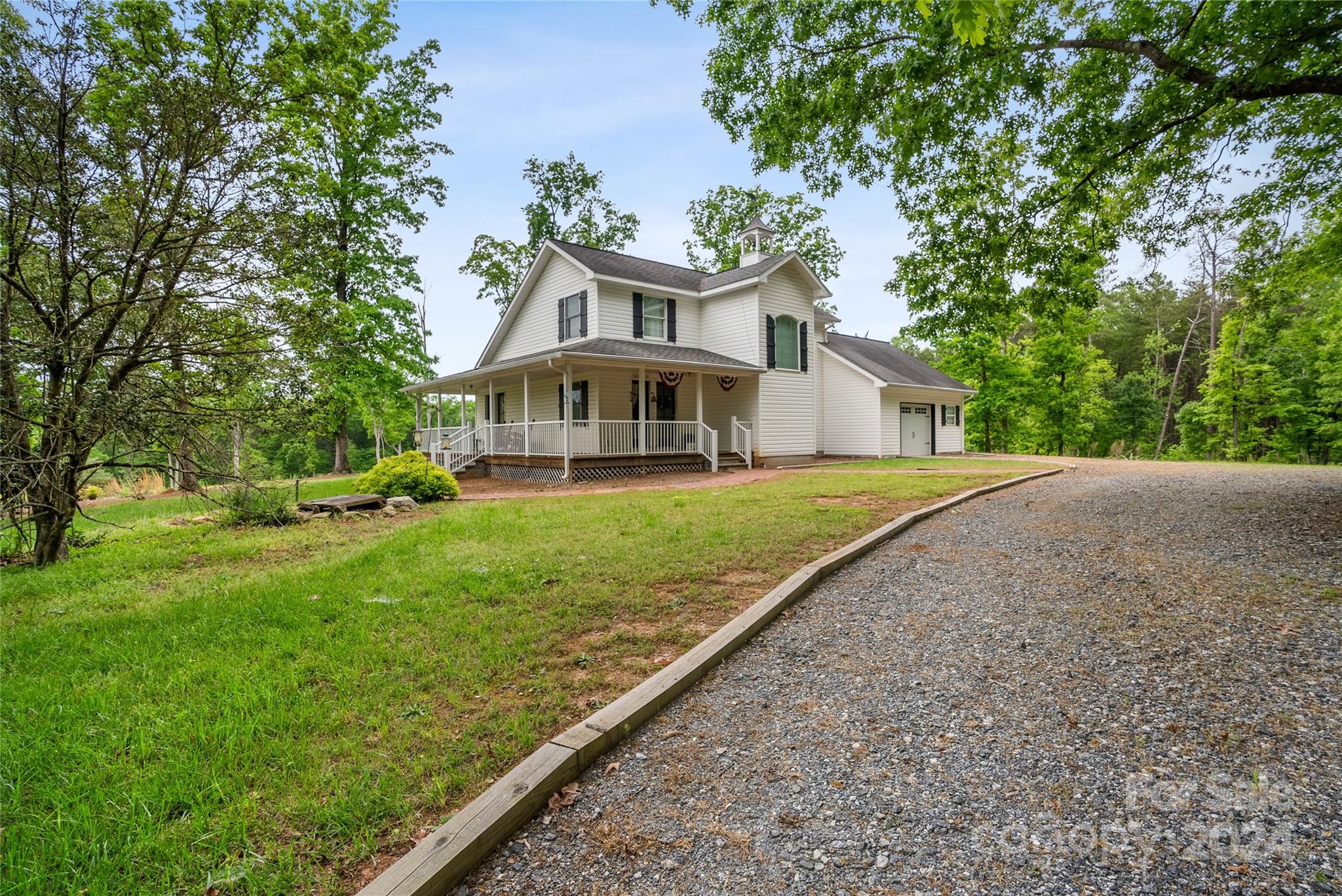 1154 Landrum Road Columbus, NC 28722 - Photo 6 of 36 a view of house with a yard