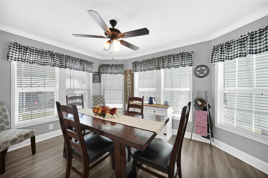 14 North Cardinal, Unit B14 Punta Gorda, FL 33950 - Photo 17 of 40 a dining room with furniture and window