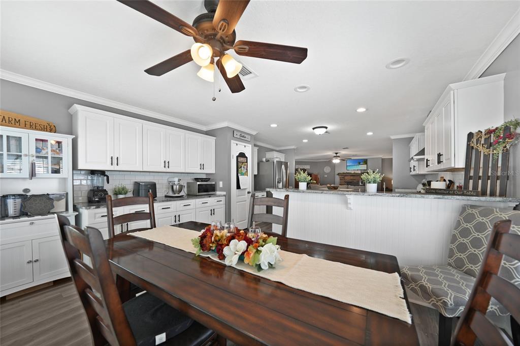14 North Cardinal, Unit B14 Punta Gorda, FL 33950 - Photo 18 of 40 a living room with stainless steel appliances furniture a dining table and kitchen view