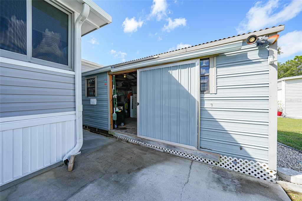 14 North Cardinal, Unit B14 Punta Gorda, FL 33950 - Photo 34 of 40 a view of a house with a wooden fence