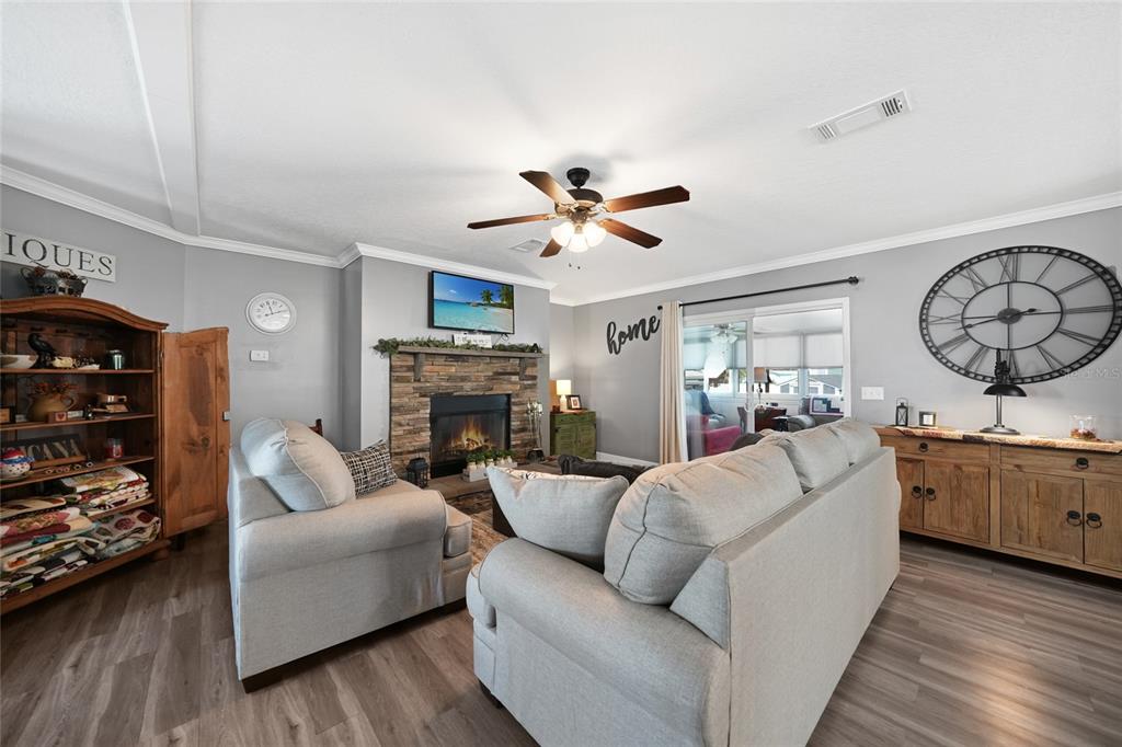 14 North Cardinal, Unit B14 Punta Gorda, FL 33950 - Photo 8 of 40 a living room with furniture and a fireplace