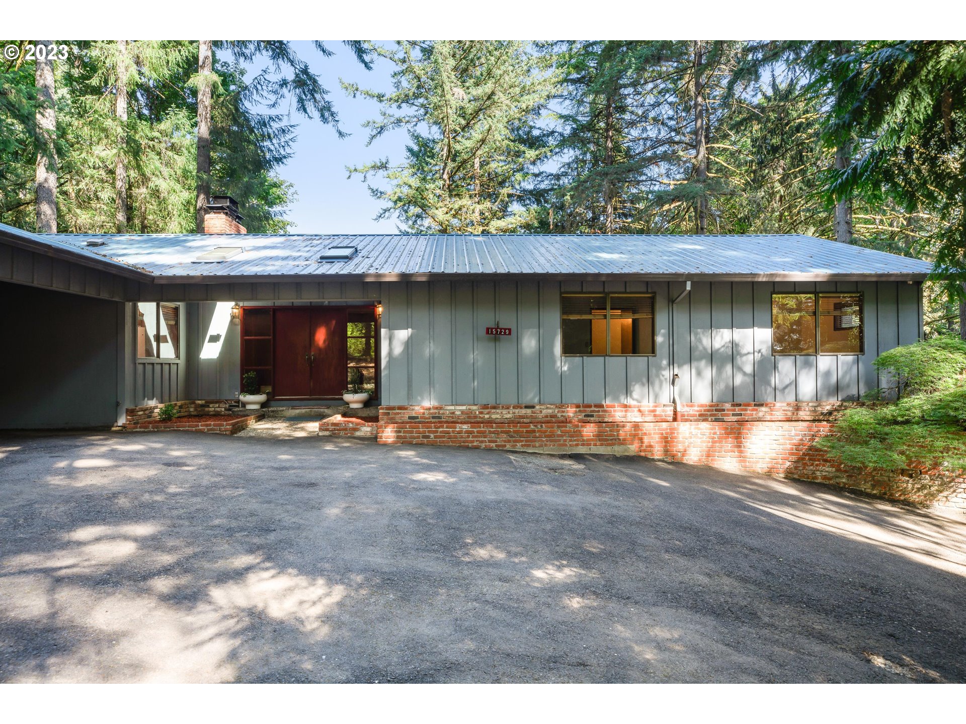 15729 Northwest Sheltered Nook Road Portland, OR 97231 - Photo 2 of 44 a view of outdoor space yard and porch
