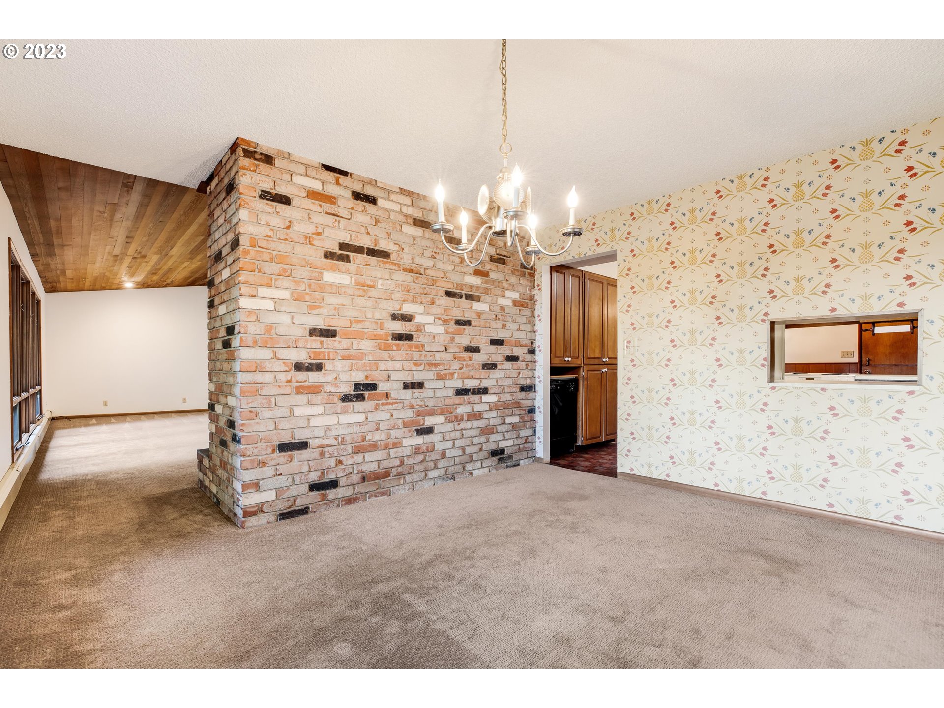 15729 Northwest Sheltered Nook Road Portland, OR 97231 - Photo 22 of 44 a view of a hallway with two windows