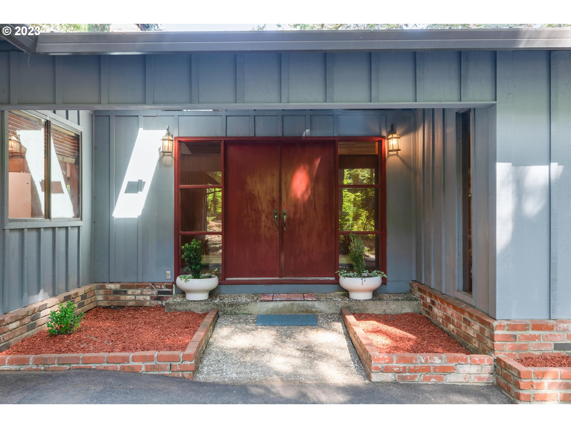 15729 Northwest Sheltered Nook Road Portland, OR 97231 - Photo 3 of 44 a view of a entrance of the house