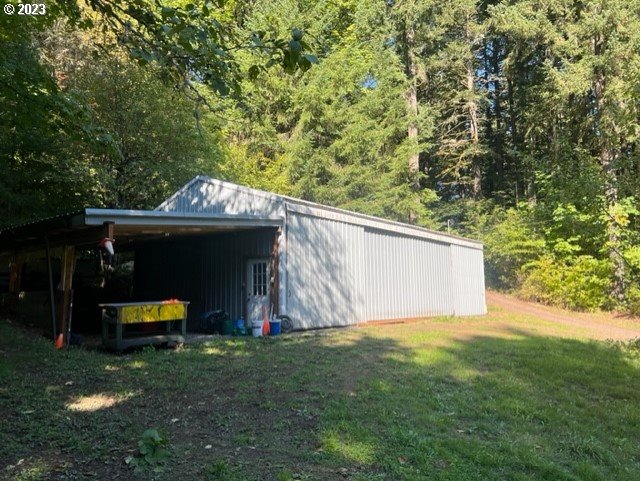 15729 Northwest Sheltered Nook Road Portland, OR 97231 - Photo 44 of 44 a view of outdoor space and garden