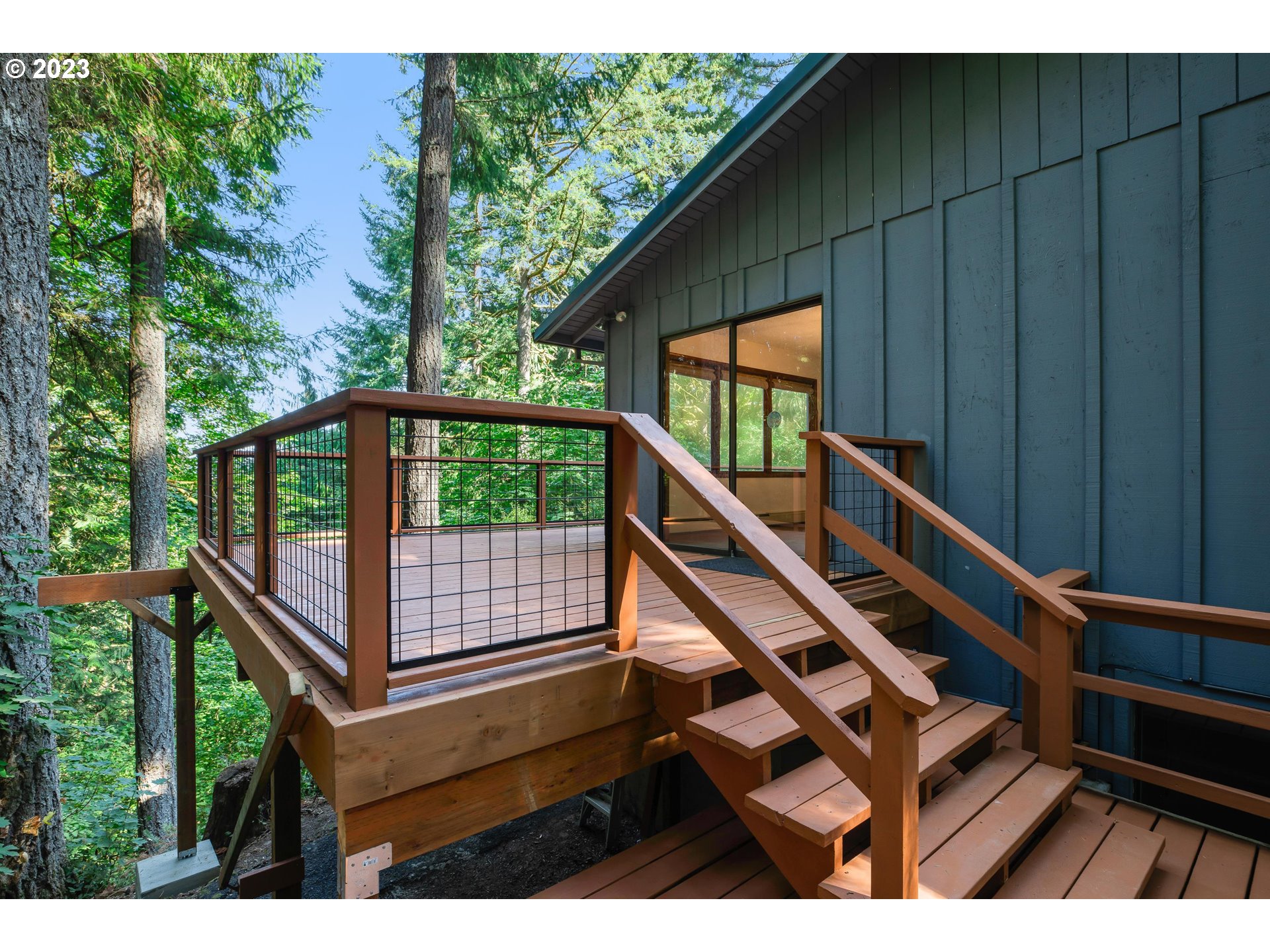 15729 Northwest Sheltered Nook Road Portland, OR 97231 - Photo 6 of 44 a view of outdoor space with seating area