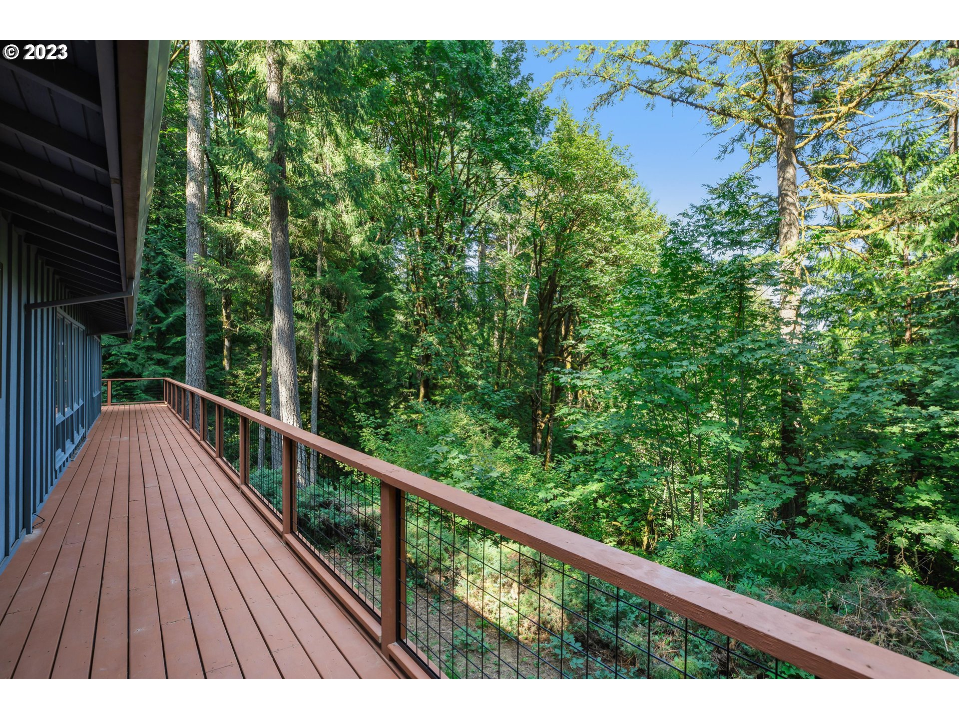 15729 Northwest Sheltered Nook Road Portland, OR 97231 - Photo 8 of 44 a view of mountain with wooden floor