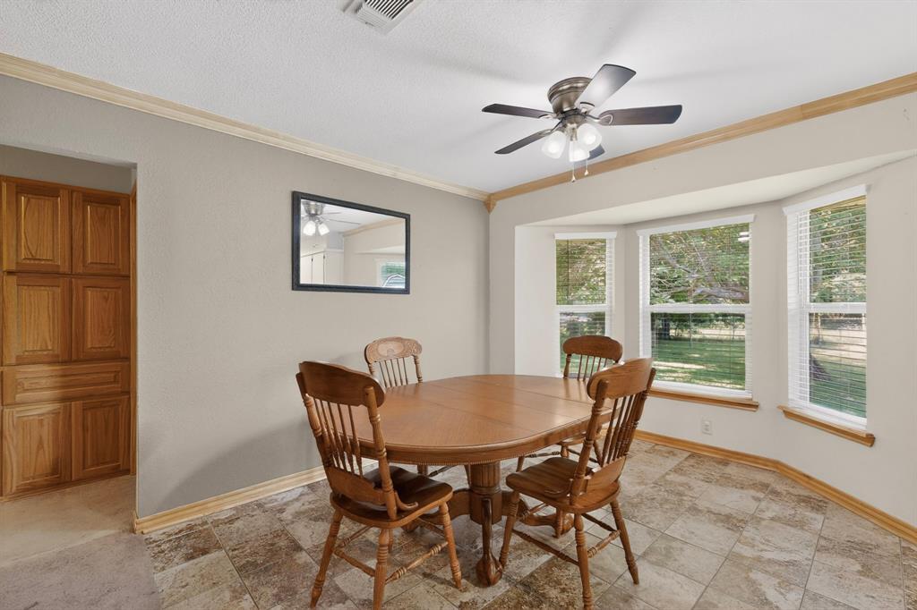 321 Redbud Street Rhome, TX 76078 - Photo 5 of 17 Dining area off of kitchen.