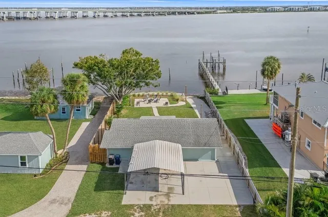 swimming pool view with a garden space