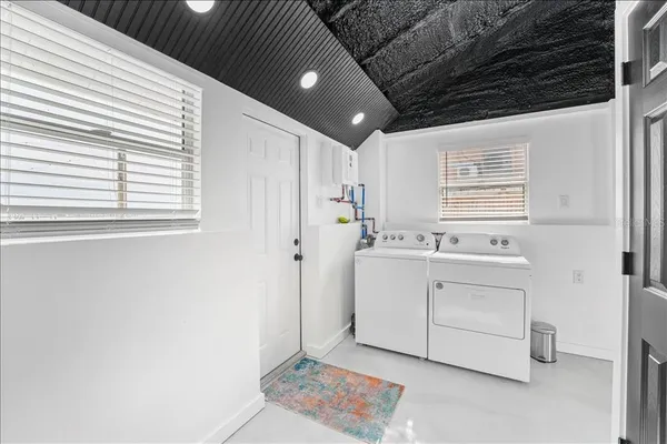 a room with dryer and washer