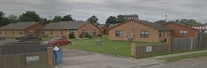 509 Old Robstown Road Corpus Christi, TX 78408 - Photo 5 of 7 a front view of a house with a yard and garage