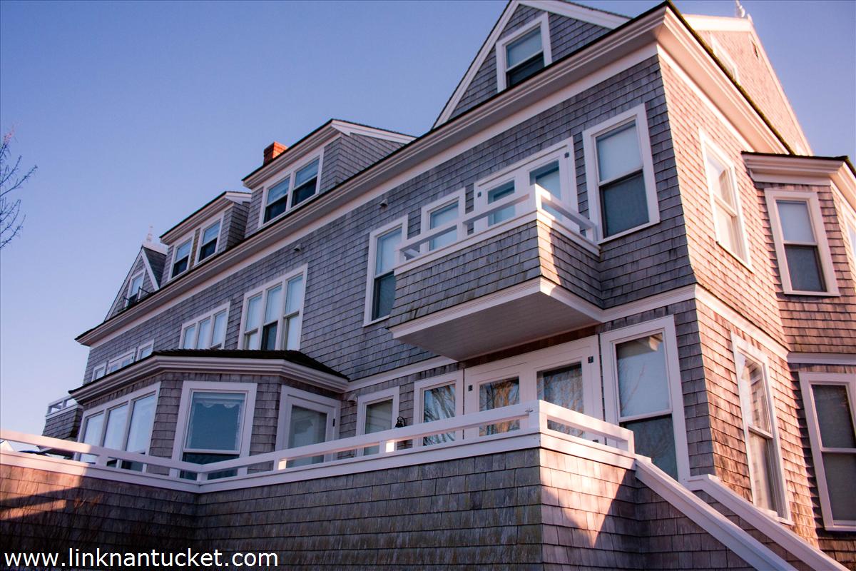 27 Cliff Road Nantucket, MA 02554 - Photo 6 of 32 a front view of a building