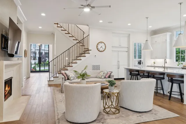 a kitchen with a sink a window and cabinets