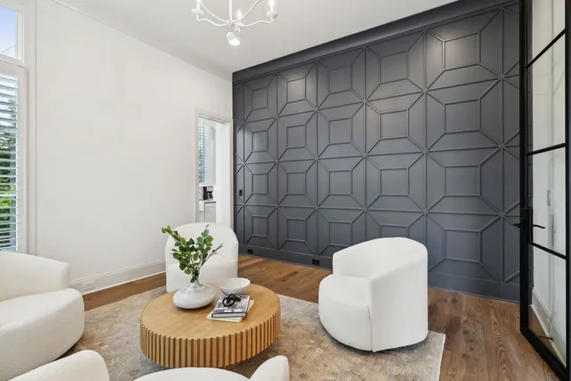 a living room with furniture fireplace and a flat screen tv