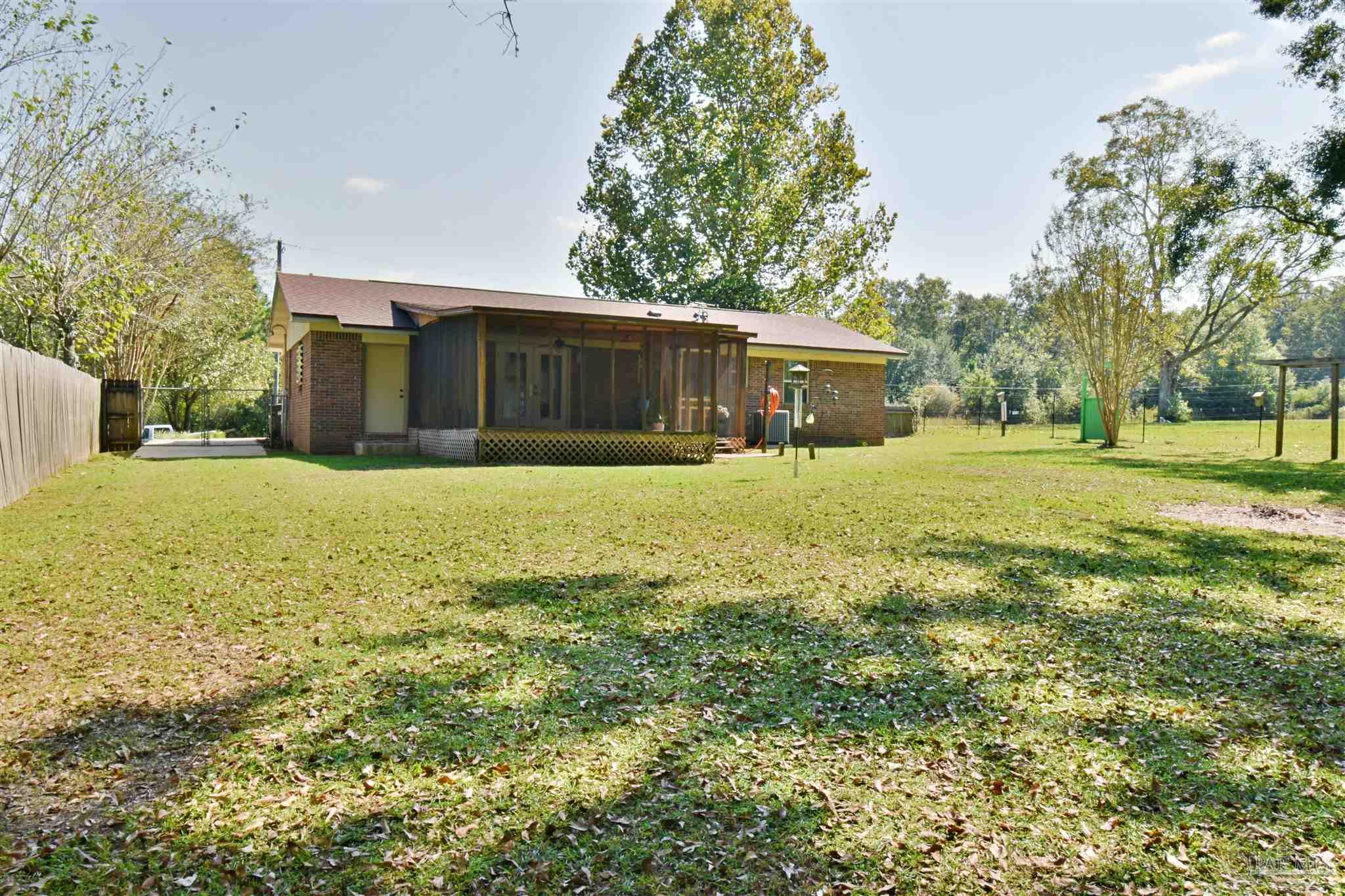 173 Navarro Road Cantonment, FL 32533 - Photo 9 of 33 Screened in Porch