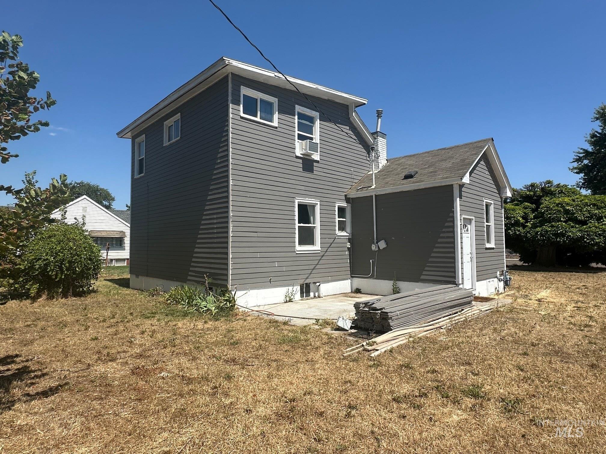 787 Southwest 3rd Street Ontario, OR 97914 - Photo 22 of 22 Back of property with a yard and a patio area