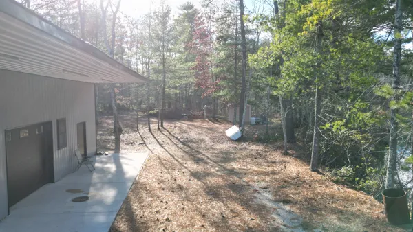 a view of a back yard of the house