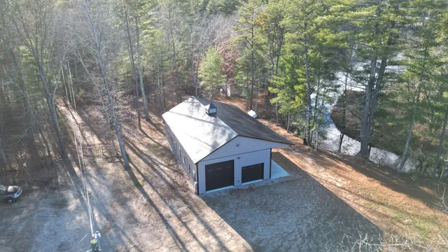 a house with trees in the background