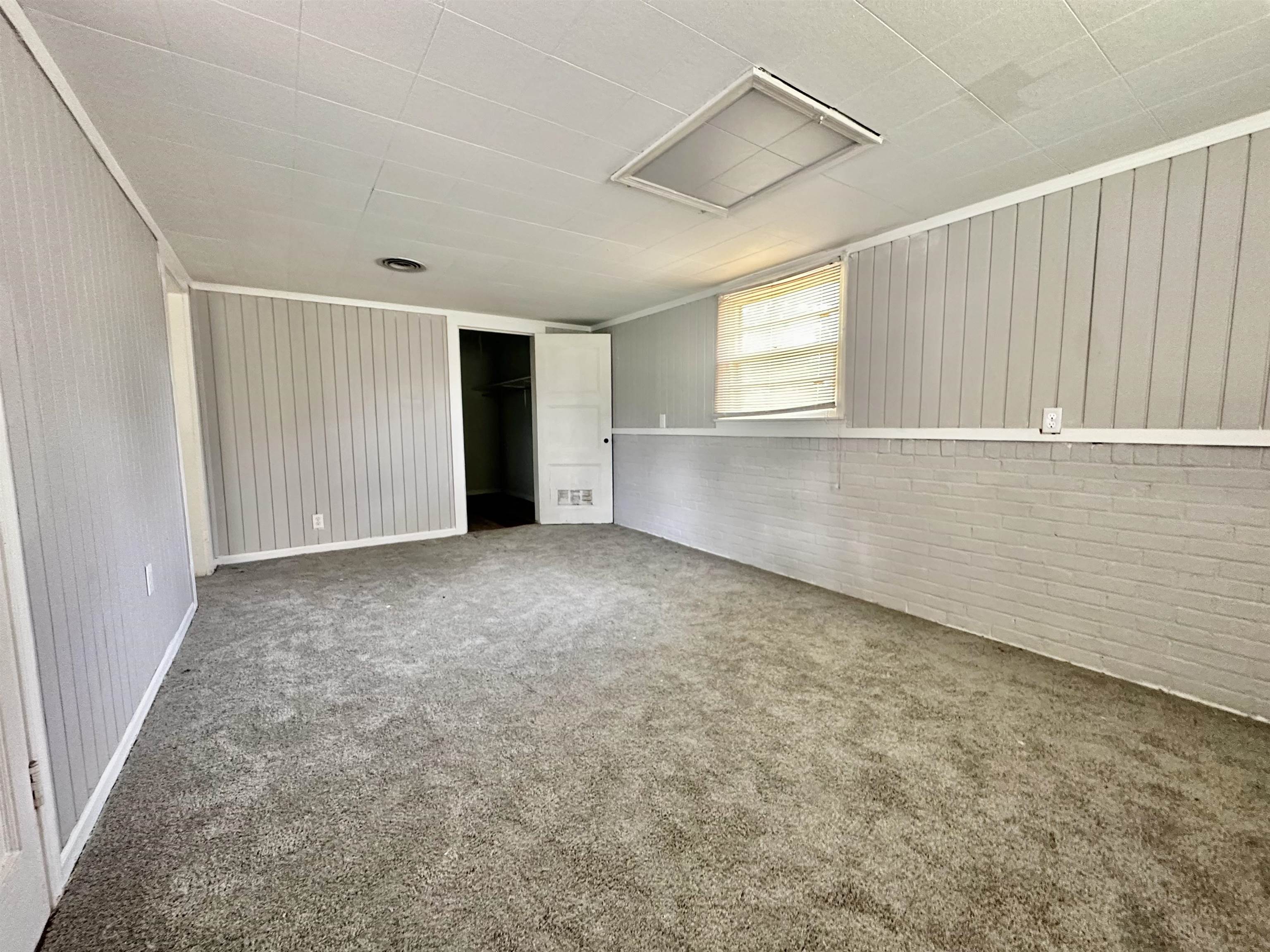 4277 Neely Road Memphis, TN 38109 - Photo 18 of 19 an empty room with windows