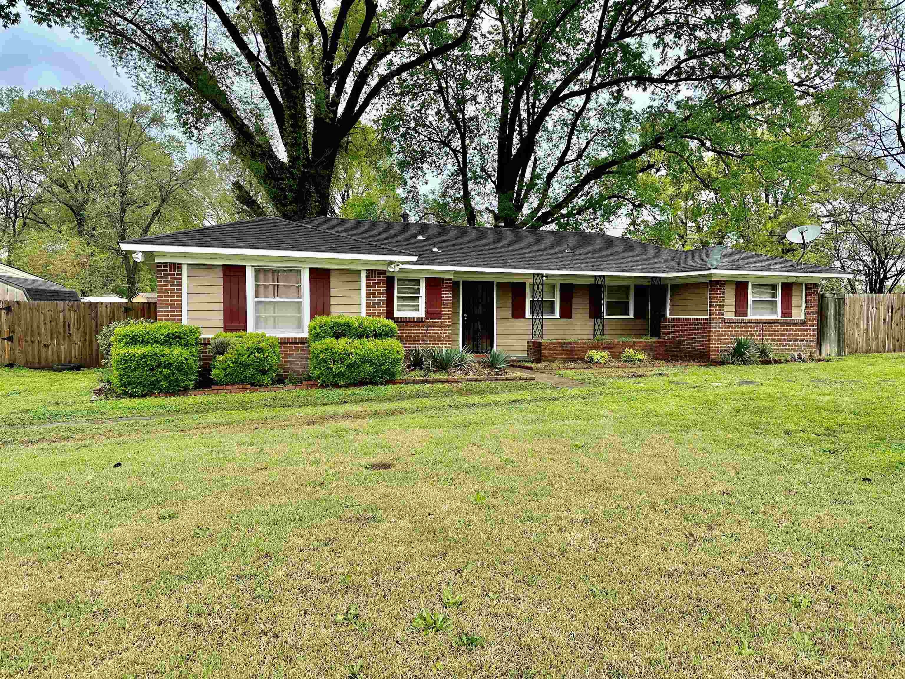 4277 Neely Road Memphis, TN 38109 - Photo 2 of 19 front view of a house with a yard