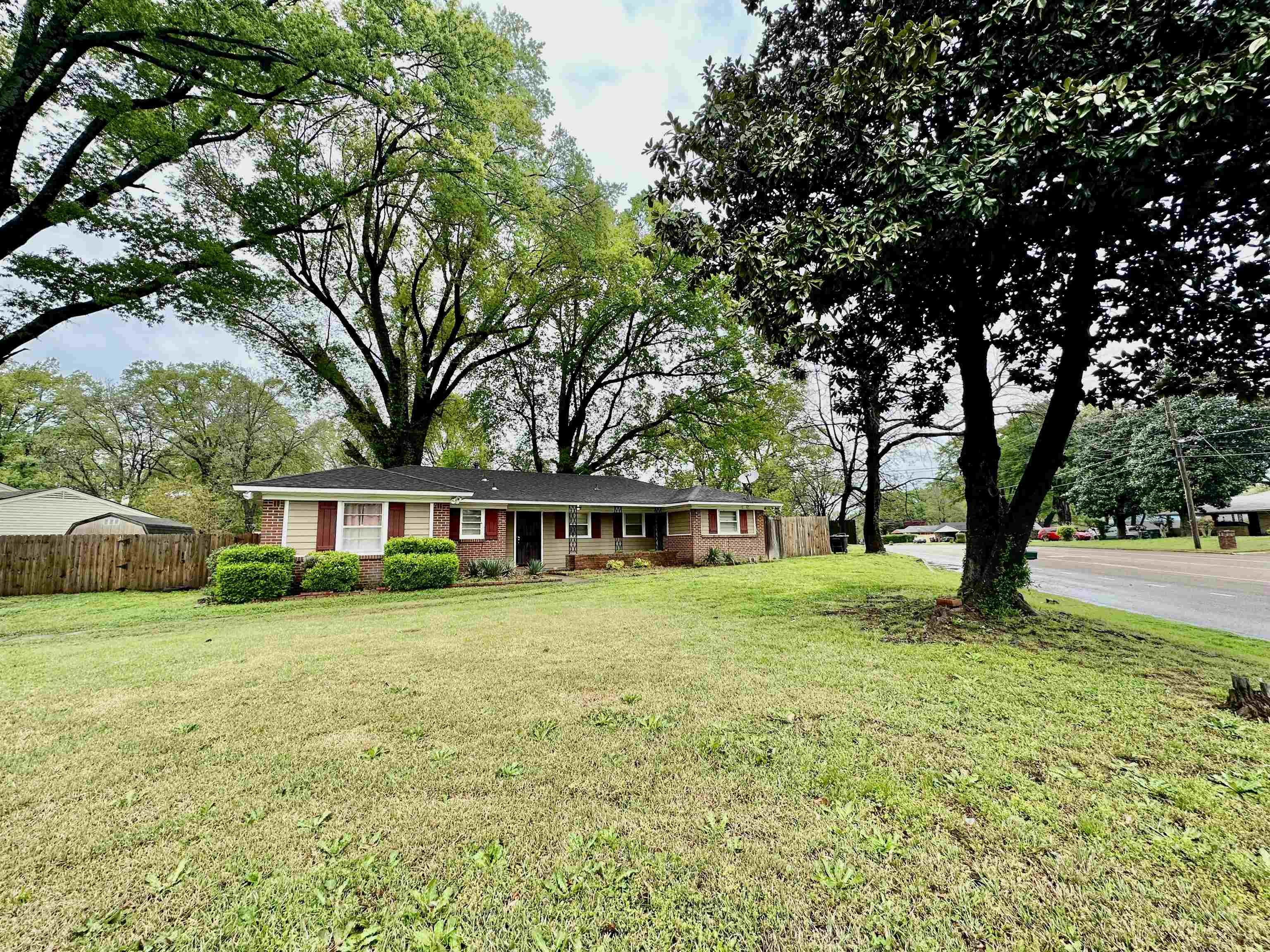 4277 Neely Road Memphis, TN 38109 - Photo 3 of 19 a view of a house with a yard