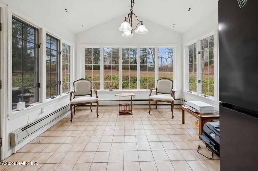 11 Roberta Lane Greenwich, CT 06830 - Photo 11 of 26 a living room with furniture and a window