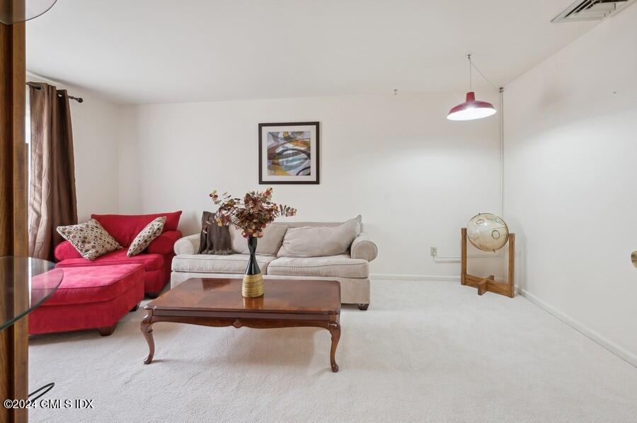 11 Roberta Lane Greenwich, CT 06830 - Photo 17 of 26 a living room with furniture