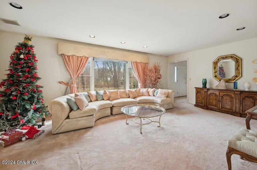 11 Roberta Lane Greenwich, CT 06830 - Photo 4 of 26 a living room with furniture and a christmas tree