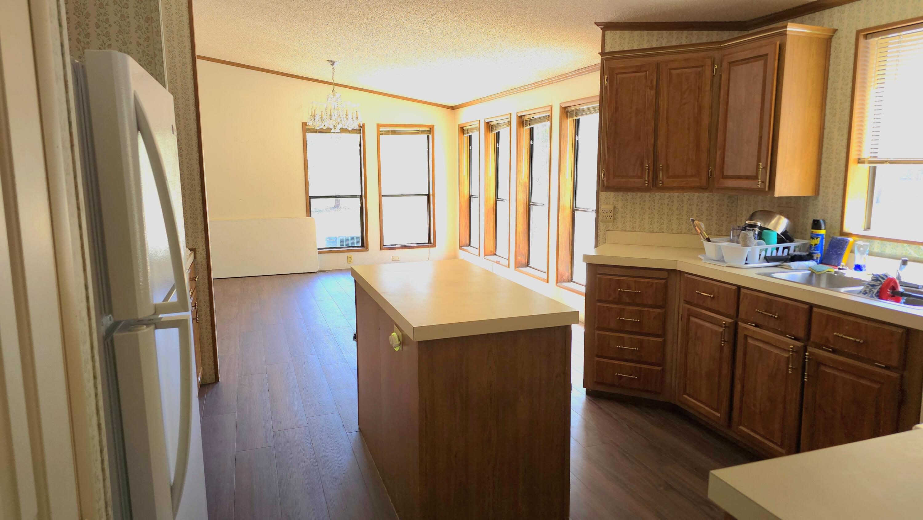16523 Sprague Loop La Pine, OR 97739 - Photo 7 of 16 a kitchen with stainless steel appliances a refrigerator and sink