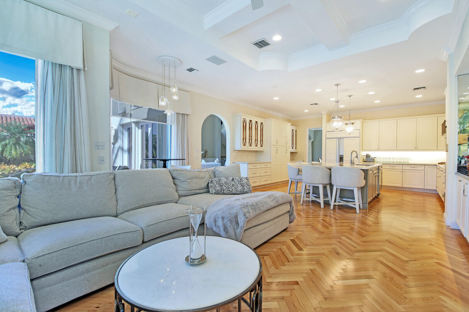 3370 Bridgegate Drive Jupiter, FL 33477 - Photo 16 of 55 a living room with furniture and kitchen view