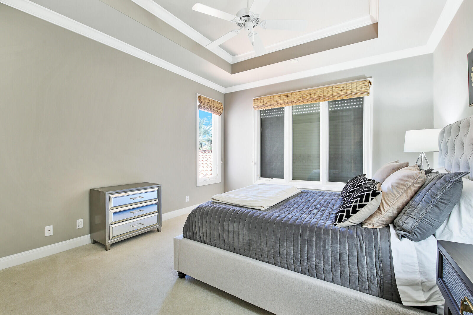3370 Bridgegate Drive Jupiter, FL 33477 - Photo 24 of 55 a bedroom with a bed and a window