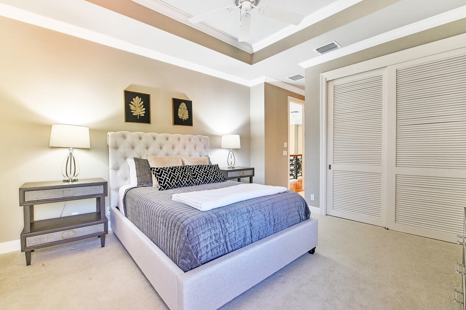 3370 Bridgegate Drive Jupiter, FL 33477 - Photo 25 of 55 a bedroom with a bed and a night stand