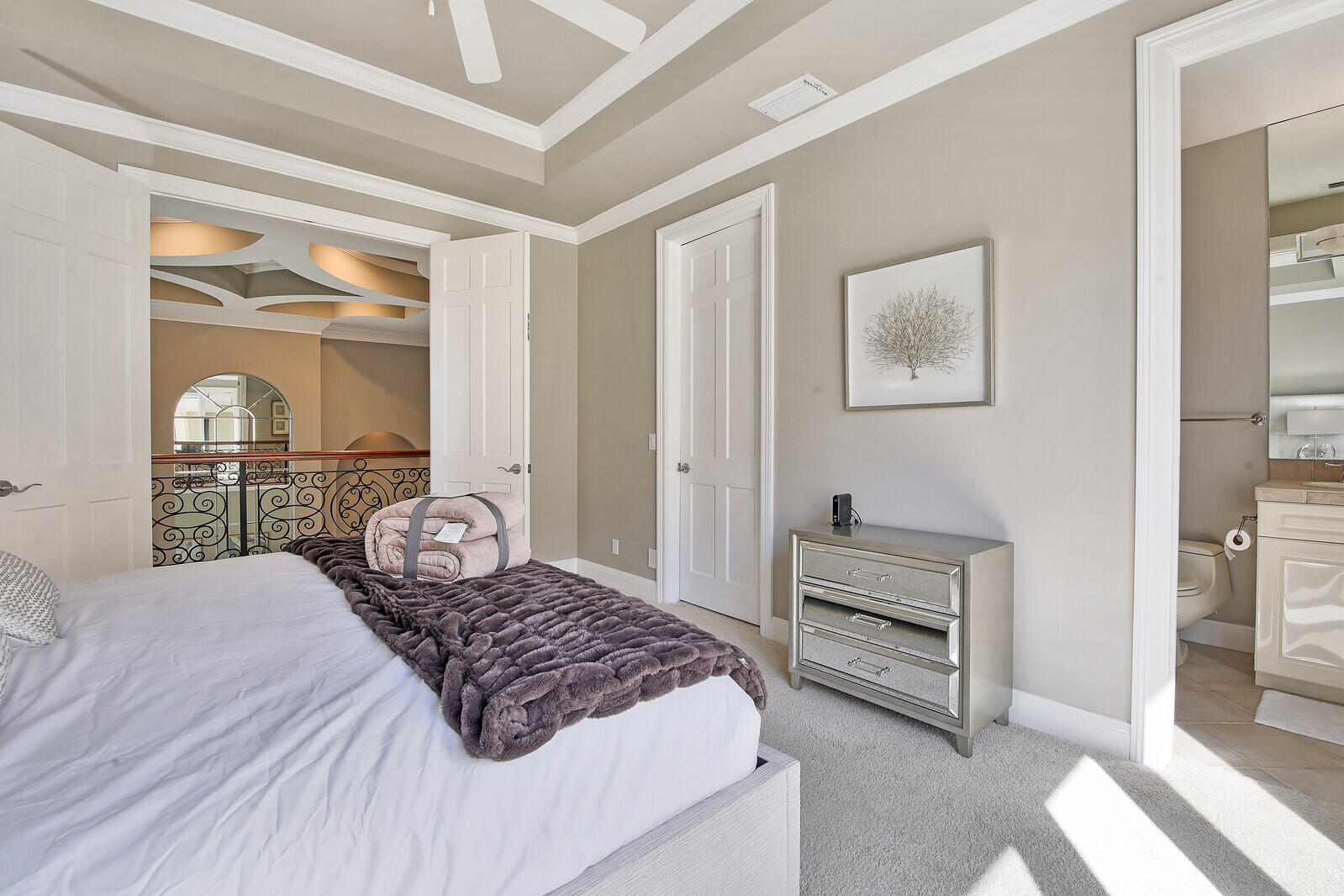 3370 Bridgegate Drive Jupiter, FL 33477 - Photo 28 of 55 a bedroom with a bed and wooden floor