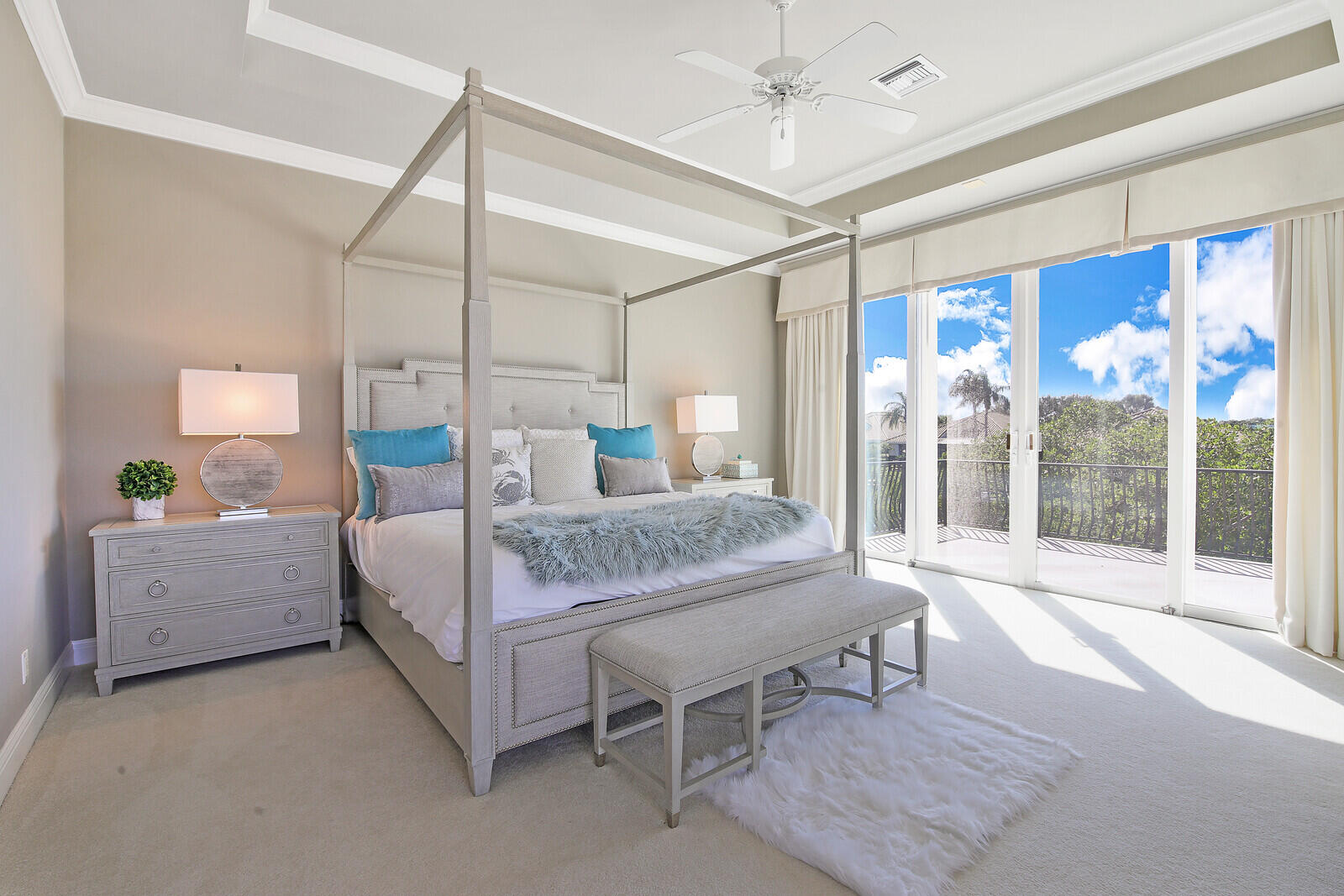 3370 Bridgegate Drive Jupiter, FL 33477 - Photo 29 of 55 a bedroom with a large bed and a window