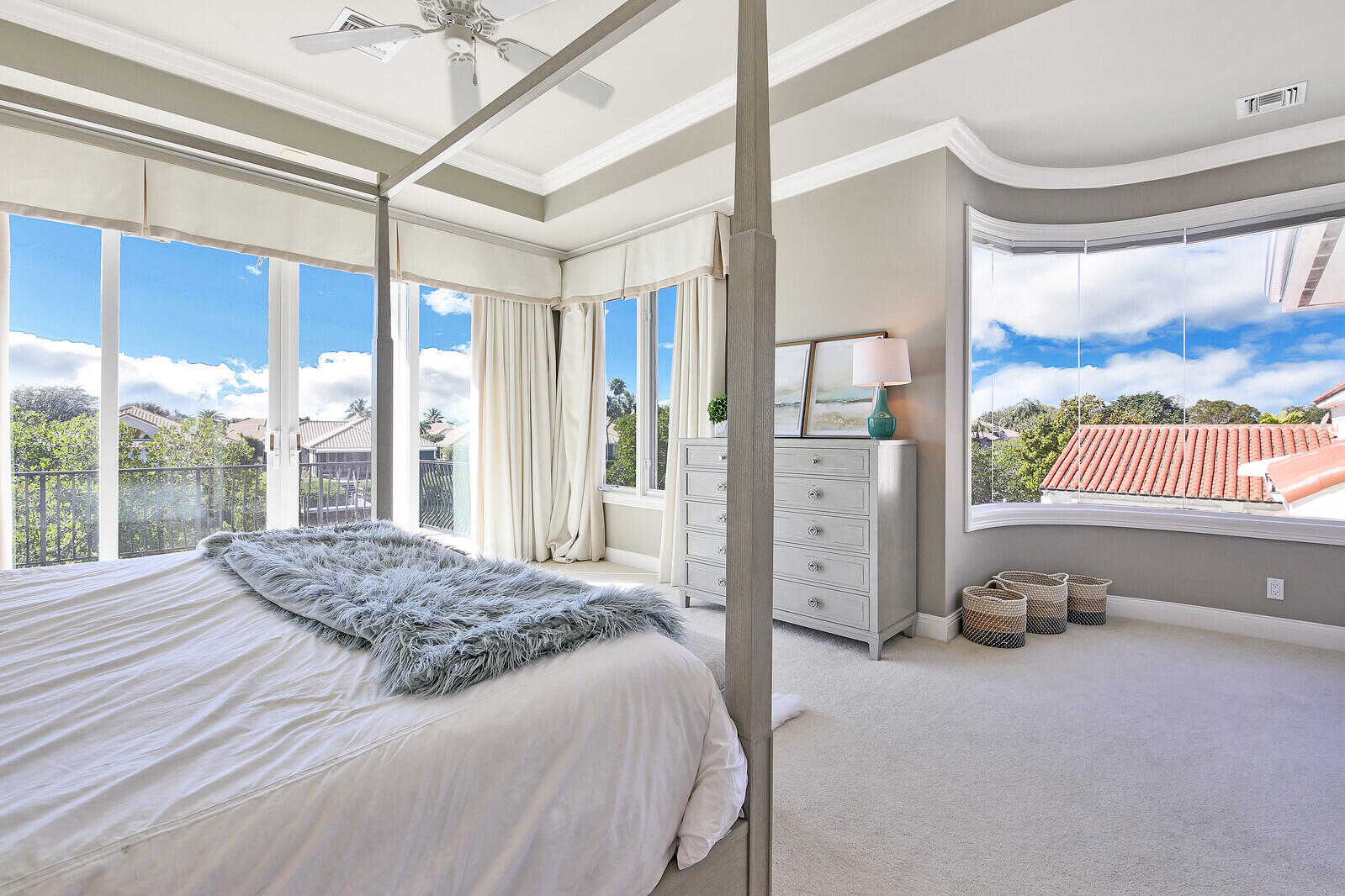 3370 Bridgegate Drive Jupiter, FL 33477 - Photo 30 of 55 a bedroom with a bed and a large window with balcony view