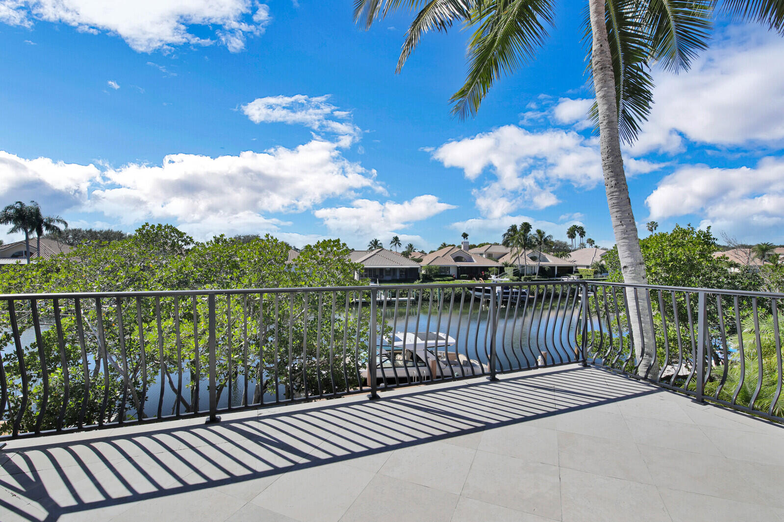 3370 Bridgegate Drive Jupiter, FL 33477 - Photo 32 of 55 a balcony with a lake view