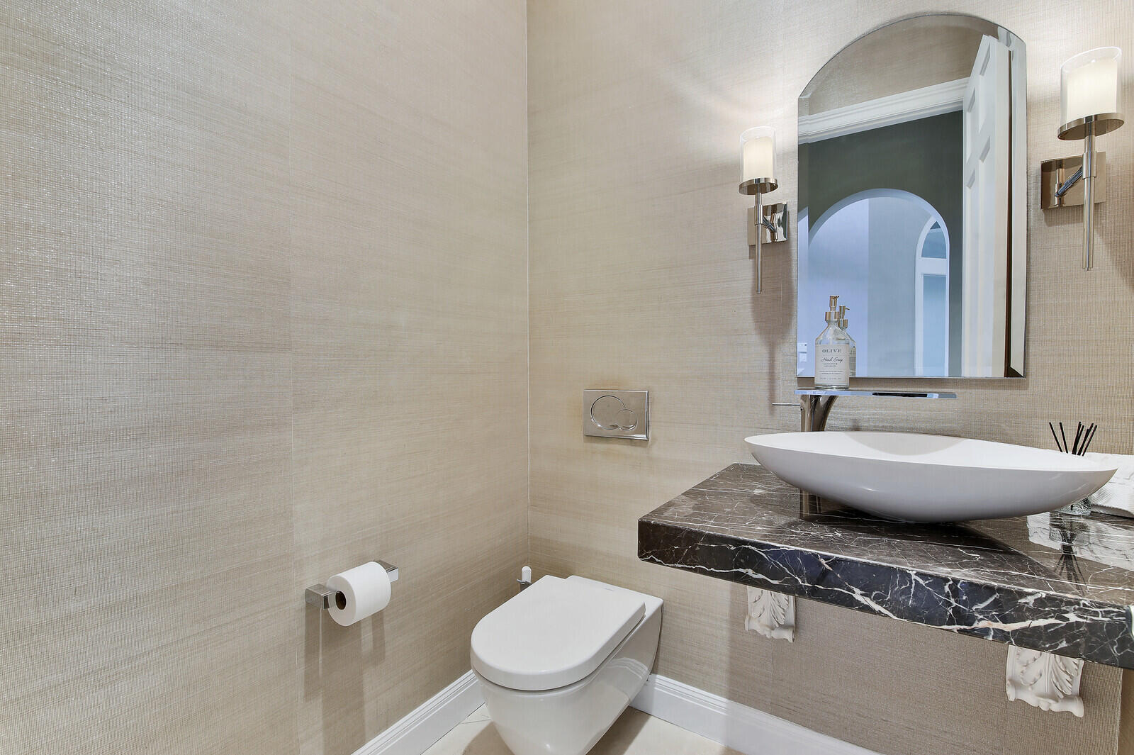 3370 Bridgegate Drive Jupiter, FL 33477 - Photo 35 of 55 a bathroom with a granite countertop toilet a sink and a mirror