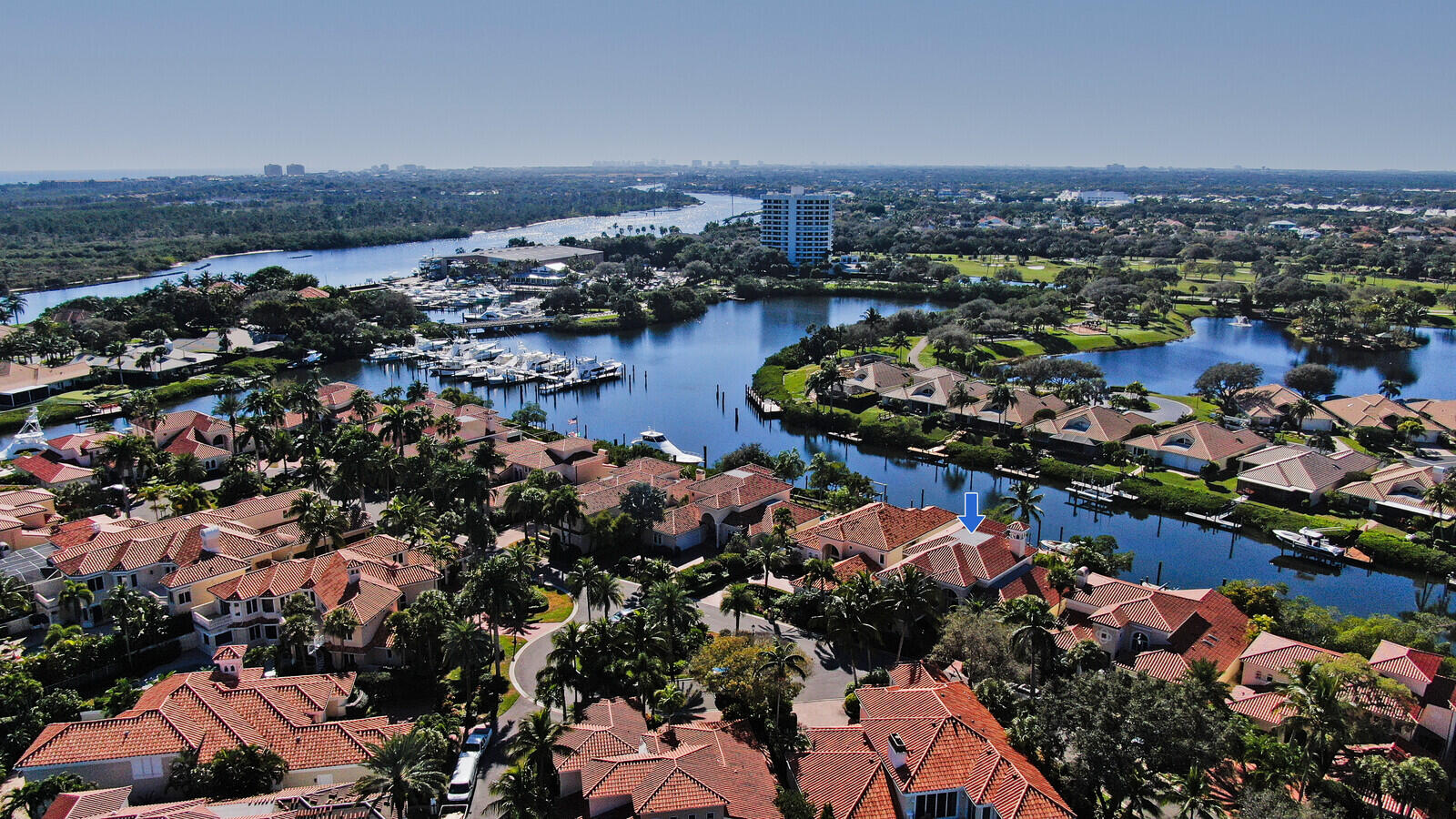 3370 Bridgegate Drive Jupiter, FL 33477 - Photo 50 of 55 an aerial view of lake and residential houses with outdoor space