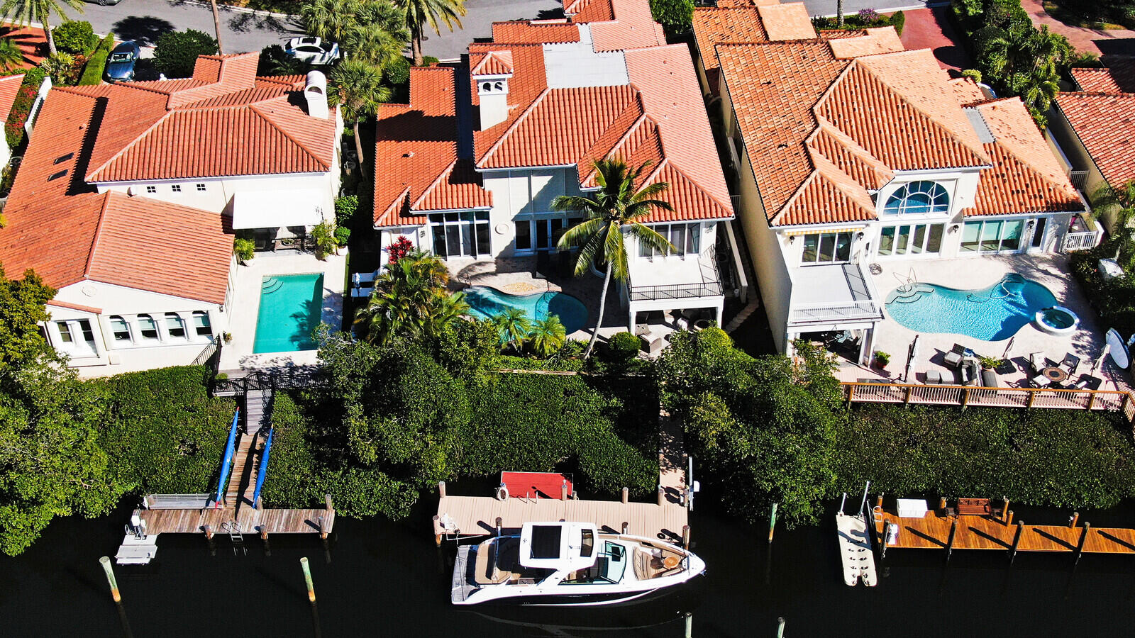 3370 Bridgegate Drive Jupiter, FL 33477 - Photo 52 of 55 an outdoor space with lots of swings and slides