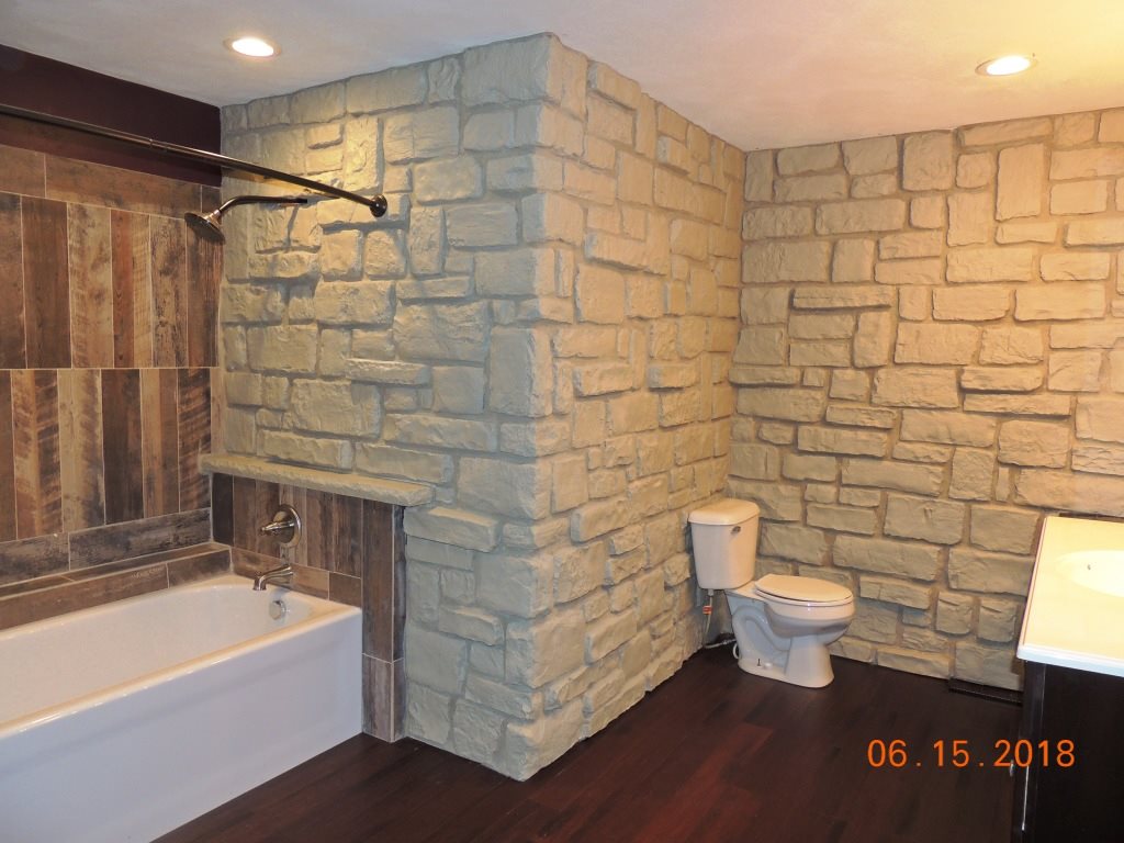 12294 County Line Road Roscoe, IL 61073 - Photo 15 of 25 a bathroom with a toilet and a shower