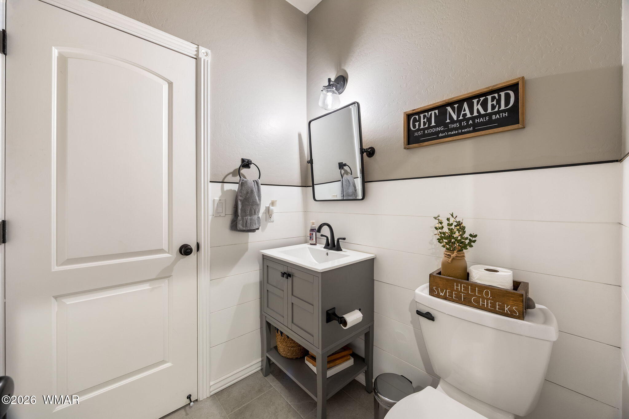 1940 Stonegate Way Heber, AZ 85928 - Photo 9 of 62 a bathroom with a sink mirror vanity and toilet