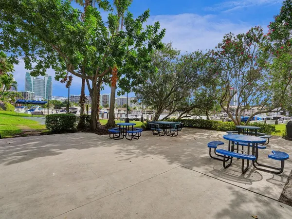 a front view of a building with a garden