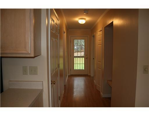 299 Betts Road Orrington, ME 04474 - Photo 8 of 25 Other. Hallway to front entry and...