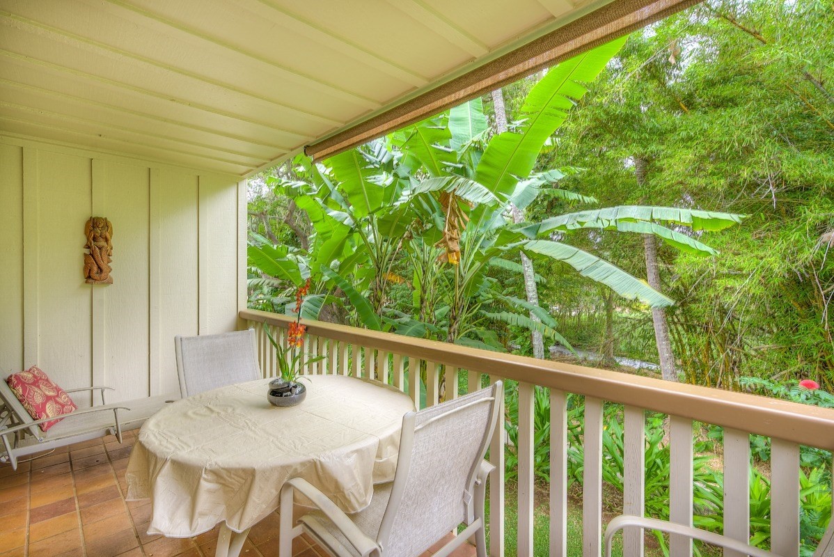 2721 Poipu Road, Unit 420 Koloa, HI 96756 - Photo 16 of 26 a view of a balcony with table and chairs