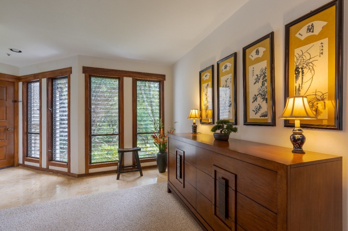 2721 Poipu Road, Unit 420 Koloa, HI 96756 - Photo 2 of 26 a bathroom with a double vanity sink and a large window